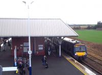 The 14.00 from Waverley bang on time at Leuchars on a dreich March afternoon, formed by Turbostar 170 450.<br><br>[Andrew Wilson 02/03/2012]