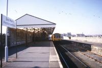 A DMU stands at Pembroke Dock in May 1986 awaiting its departure time with a service to Swansea.<br><br>[Ian Dinmore /02/1986]