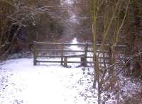 An idyllic scene on the former LNWR line through Daventry on 10th February. Given that you can walk around the end of the fence, the stile is possibly somewhat under-utilized. View looks towards Leamington.<br><br>[Ken Strachan 10/02/2012]