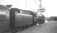<I>'Scottish Rambler No 6'</I> stands at Carstairs on 26 March 1967 behind Britannia Pacific no 70032 <I>Tennyson</I> shortly after arrival from Glasgow Central [see image 35364].<br><br>[K A Gray 26/03/1967]