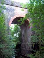 Just to the east of the former Gilsland station the Newcastle - Carlisle line crosses the Poltross Burn on this impressive structure. <br><br>[Andrew Wilson 06/09/2011]