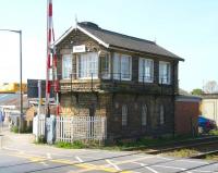 The substantial stone signal box alongside the busy level crossing at Castlegate, Malton, looking south in May 2009. Malton station is half a mile off to the right [see image 23497].<br><br>[John Furnevel 22/04/2009]
