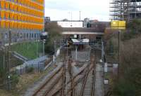 Looking north into Bury Interchange, the terminus on the Manchester Metrolink on 03 March 2012. The station was opened in 1980 by BR with Class 504 EMUs. It was closed and converted for the Metrolink, reopening in 1992. Prior to this station opening BR services from Manchester had used Bury Bolton Street station which is now part of the East Lancashire Railway. With thanks to Alisdair McNicol for correcting the information on the earlier caption.<br><br>[John McIntyre 03/03/2012]