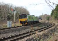 Another semaphore on borrowed time. Centro liveried 150119 and a Northern sister unit approach Poulton from Preston on a Blackpool North service in March 2012. Colour lights will replace this signal and others on the Fylde as part of the electrification and modernisation of the Manchester to Blackpool line.<br><br>[Mark Bartlett 10/03/2012]