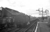 The 10am Euston - Aberdeen, having picked up a banking locomotive, heads north out of Beattock station on 14 July 1962. <br><br>[R Sillitto/A Renfrew Collection (Courtesy Bruce McCartney) 14/07/1962]