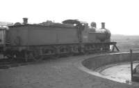 43185 stands on a stored locomotive line alongside the turntable at Buxton shed in April 1962 some 8 months after official withdrawal. The ex-Midland 3F 0-6-0 was eventually cut up at Crewe Works the following October.<br><br>[K A Gray 16/04/1962]