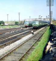 DMUs race through Saughton Junction in the summer of 1959 with westbound trains on the Forth Bridge and Glasgow lines respectively.<br><br>[A Snapper (Courtesy Bruce McCartney) 31/07/1959]