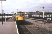 A Class 33 brings a service from London Waterloo into Weymouth in early September 1983. A class 47 locomotive stands ready to depart with an unidentified train in the right background.<br><br>[Ian Dinmore /09/1983]