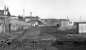 Looking over the remains of the level crossing towards the former Kirkliston station following tracklifting. The station closed to passengers as long ago as 1930 although the line had continued in use for freight until the mid 1960s.<br><br>[Frank Spaven Collection (Courtesy David Spaven) //]