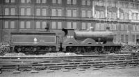 Wainright ex-SECR 'D' class 4-4-0 no 31737 of 1901 stands in the sidings alongside Stewarts Lane shed in the 1950s. The locomotive was subsequently preserved and restored and is now on display at the NRM in York... via Tweedmouth [see image 32893]. <br><br>[K A Gray //]
