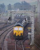 Freightliner 66523 held in the loop at Abington with a southbound coal train on a murky 15 March 2012.<br><br>[Bill Roberton 15/03/2012]