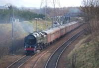 70013 <I>Oliver Cromwell</I> brings up the rear of the empty stock of the 'Heart of Midlothian' Huddersfield - Edinburgh charter passing Brunstane on 17 March. 47760 was on the front of the train at this stage, with one D Spaven a guest on the footplate of 70013!<br><br>[Bill Roberton 17/03/2012]