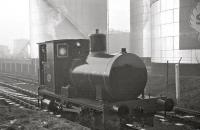 Fireless 0-4-0 steam locomotive no 8 [AB1952/1928] stands alongside the Shell refinery adjacent to the former Ardrossan North station on 29 December 1962. [See image 37623]<br><br>[R Sillitto/A Renfrew Collection (Courtesy Bruce McCartney) 29/12/1962]