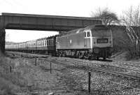 47129 passes behind Lockes Siding signal box (the wooden steps on the extreme right gave access to it) in April 1976 as it approaches Goosehill Junction, Normanton, on the ex-MR main line with what is thought to be the 07.30 Birmingham - Newcastle. [See image 37457]<br><br>[Bill Jamieson 03/04/1976]