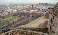 Rather a postcard view: Princes Street Gardens and Waverley station seen from Edinburgh Castle. In the foreground is the rather unusual <i>Cemetery for Soldiers Dogs</i>. The view is from late in the year 1993.<br><br>[Ewan Crawford //1993]