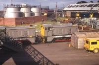 The usual Type 2s line the north wall of Inverness MPD in 1976, as the two Howard Doris shunters await the final leg of their journey to Strome Ferry sidings.<br><br>[Frank Spaven Collection (Courtesy David Spaven) //1976]