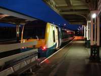 Arriva Trains Wales 175103 rests in the west end bay at Llandudno Junction whilst working the 18.08 shuttle service from Llandudno Town station and 18.26 return. This working is slotted in between the set arriving on the 15.09 ex-Birmingham International and departing on the 18.44 service to Manchester Piccadilly. <br><br>[David Pesterfield 28/02/2012]