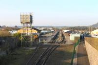 Early morning scene at Carmarthen station on 24 March showing Sprinter <I>Bubble Car</I> 153362 that had stabled overnight in the bay platform. In the foreground is the old line to Aberystwyth and Cardigan which now terminates under the bridge from which the picture was taken. Carmarthen opened in 1902, replacing an earlier station just to the north of here [see image 38198] and enjoys a regular service of trains including a daily HST service to Paddington.<br><br>[Mark Bartlett 24/03/2012]