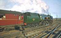 The return leg of <I>The Solway Ranger</I> railtour leaves Carlisle for Leeds City on 13 June 1964 behind rebuilt 'Merchant Navy' Pacific 35012 <I>United States Lines</I>.<br><br>[Robin Barbour Collection (Courtesy Bruce McCartney) 13/06/1964]