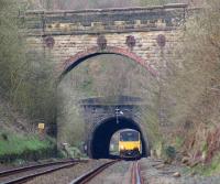 A Clitheroe to Manchester Victoria service exits the 324 yard Wilpshire Tunnel on the climb to the summit at Ramsgreave on 31 March 2012. <br><br>[John McIntyre 31/03/2012]