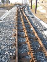 Part of the yet-to-open Puy de Dome Tramway near Clermont Ferrand, photographed in March 2012. At 1460m, Put de Dome is the highest of the Auvergne volcanoes. The electric rack-and-pinion Tramway is due to open later this year. Note the sleepers.<br><br>[John Thorn 24/03/2012]