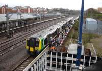 A large number of commuters heading for the platform 2 exit at Tamworth Low Level station on 4 April after disembarking from the London Midland 17.47 stopping service to Euston. <br><br>[David Pesterfield 04/04/2012]