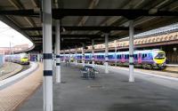 TransPennine 185s using the west side platforms at York in March 2010. A service to Middlesbrough is leaving platform 11 on the left, while at platform 9 two southbound trains are about to join forces for the onward journey to Manchester Airport.<br><br>[John Furnevel 21/03/2010]