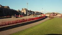 Around 1996 the remains of Lossiemouth station were tidied up into a garden and carpark. This 1997 view looks towards the buffer stops with the remains of the very long single platform on the left. The nearly as long goods loading bank remains out of shot off to the right.<br><br>[Ewan Crawford 02/02/1997]