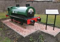 Newly installed sculpture on Kelty Main Street to commemorate the Blairenbathie branch which crossed nearby at the 'White Gates' and served various collieries and a gasworks. Bears a passing resemblance to a Hunslet 'austerity' 0-6-0ST. [See image 36699]<br><br>[Bill Roberton 07/04/2012]