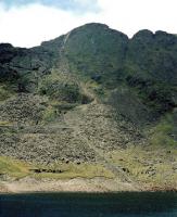 Before the Ffestiniog was flooded near Tan-y-Grisiau, there were <br>
connections to many slate quarries. This picture is looking across the <br>
reservoir to the inclines that served the Moelwyn Mine. Taken in April <br>
1974, when the old Ffestiniog trackbed was under water and the new not <br>
yet built! <br><br>[John Thorn /04/1974]