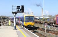 First Great Western 166 210 running into Didcot station on 29 March with an Oxford - Paddington service.<br><br>[Peter Todd 29/03/2012]