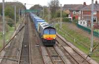 DRS 66422 passing the Oxheys up goods loop to the north of Preston with the Mossend to Daventry intermodal service on the afternoon of 6 April 2012.<br><br>[John McIntyre 06/04/2012]