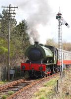 WD 75254 (latterly NCB No 7 of Comrie Colliery), Bagnall 2777 of 1945, leaves Bo'ness with the 12.15 to Manuel on 9 April. [See image 25999]<br><br>[Bill Roberton 09/04/2012]