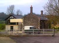 Some way South of Pensford viaduct [see image 26020], there is an industrial estate, which happens to contain the remarkably well preserved station of Hallatrow, seen here in April 2012. The apparently inflated signal box is an extension built between the platforms; the aged Land Rover is a nice touch. This station was the Western junction station for the Cam Valley branch, of 'Titfield Thunderbolt' fame.<br><br>[Ken Strachan 07/04/2012]