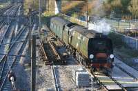 Having just drawn forward from the 'Cumbrian Mountain Express',  34067 <I>Tangmere</I> waits in the exchange siding at Farington Junction on 12 April 2012. The railtour was taken over by 86259 <I>Les Ross</I>  (standing round the curve to the right) for the return trip to Euston. After the train had set off south, 34067 reversed back to Lostock Hall Junction before heading for Carnforth via Preston.<br><br>[John McIntyre 12/04/2012]