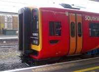 Looking back... but not in anger: the driver of South West Trains 159001, forming the 14.42 to Bristol Temple Meads, checks on the guard's instructions before leaving Bath Spa on 7 April 2012.<br><br>[Ken Strachan 07/04/2012]