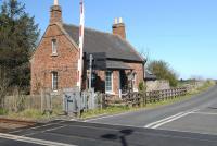 Rural tranquility on the ECML in April 2012. The former crossing keepers cottage at Cragg Mill (or Crag Mill or Cragmill) in Northumberland. Located between Belford and Smeafield, Cragg Mill station was an early ECML casualty, closing to passengers in 1877.<br><br>[Brian Taylor 05/04/2012]