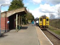 153312 picks up at Llangammarch Wells on the 15.08 Heart of Wales Line service to Shrewsbury on 12 April. <br><br>[David Pesterfield 12/04/2012]