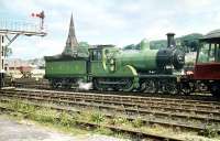 Scene in the sidings to the south of Lockerbie on 13 June 1959 during the SLS 'Golden Jubilee Special' railtour from Glasgow Central. Locomotive no 49 <I>Gordon Highlander</I> has just completed the run-round manoeuvre and is awaiting the signal to take the train back into the platform before commencing the next leg of the journey to Dumfries via Lochmaben. [See image 37446]<br><br>[A Snapper (Courtesy Bruce McCartney) /06/1959]