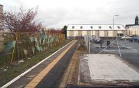 The former Bathgate station (1986-2010) with the trackbed partially filled in. Looking over the fencing towards the site of the buffer stops on 17 April 2012. [See image 16421]<br><br>[John Furnevel 17/04/2012]