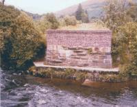 Here is a view of the C&O before Sustrans was even invented. This missing bridge over the River Balvag required a detour in 1974. No doubt a new deck has now arrived. View looks towards Strathyre.<br><br>[Ken Strachan /05/1974]