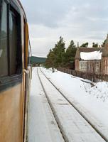 Passing north through the former Moy station loop behind 47644 'The Permanent Way Institution' in early 1990. <br><br>[Ewan Crawford //1990]