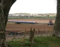 The 11.40 Glasgow Central - London Euston Pendolino at speed just south of Carstairs on 17 April 2012. The train is crossing the River Clyde on Float Viaduct.<br><br>[John Furnevel 17/04/2012]