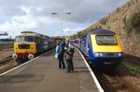 Attracting an audience at Penzance on 22 April is  47580 'County of Essex' at the head of a railtour bound for Lancaster and carrying the <I>Cornish Riviera Express</I> headboard. Meantime, on the right, a First Great Western HST has just arrived ecs from Long Rock carraige cleaning and maintenance depot.<br><br>[John McIntyre 22/04/2012]