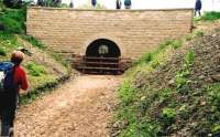 Another intriguing relic of the Ticknall Tramroad [see image 38424] is this tunnel, recently restored by tramway enthusiasts. The gate is there to stop cattle relining it.<br><br>[Ken Strachan /08/2010]