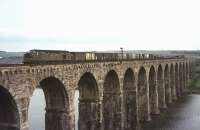 An EE Type 4 hauls a northbound mixed freight over the Royal Border Bridge in 1964. The photographer's great-great-grandfather was a stonemason who helped to build the bridge between 1847 and 1850.<br><br>[Frank Spaven Collection (Courtesy David Spaven) //1964]