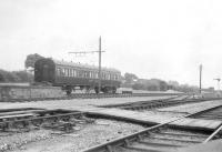 East Anstey was the first station in Devon on the Taunton to Barnstaple branch. We stayed there in this camping coach in August 1952. There was still a pickup freight running at the time that shunted the goods yard a few times during the week. I'm sure of the dates because I just remember a violent storm on the Friday night - the same one that washed out Lynmouth on the other side of Exmoor. <br><br>[John Thorn /08/1952]