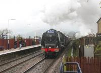 The green Duchess 46233, on the last leg of the journey from Barnhill to Preston, climbs out of the Ribble Valley in pouring rain at Langho with the Great Britain V tour on 28 April (Day 6). The train had travelled via the GSW and S&C routes.<br><br>[Mark Bartlett 26/04/2012]