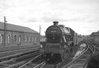 Train 1S67, the 9.20am London St Pancras - Glasgow Central Saturday relief <I>Thames-Clyde Express</I> about to run into Carlisle on 5 August 1967. The locomotive is Holbeck 'Jubilee' no 45593 <I>Kolhapur</I> which has handled the journey north from Leeds via the S&C. 45593 was officially withdrawn by BR two months later and is now preserved.<br><br>[K A Gray 05/08/1967]