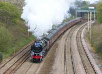 Less than 2 miles out of Preston at the start of Day 7 (27 April 2012) of the <I>Great Britain V</I> railtour, with 70013 'Oliver Cromwell' approaching Farington Curve Junction gradually building up speed. The train had been routed onto the slow line to allow a following London bound Pendolino to pass it before Balshaw Lane Junction, the southern end of the 4 track section from Preston.<br><br>[John McIntyre 27/04/2012]